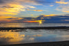 Summer sunrise along the shores of the Atlantic Ocean in Virginia Beach, Virginia.