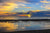 Summer sunrise along the shores of the Atlantic Ocean in Virginia Beach, Virginia.