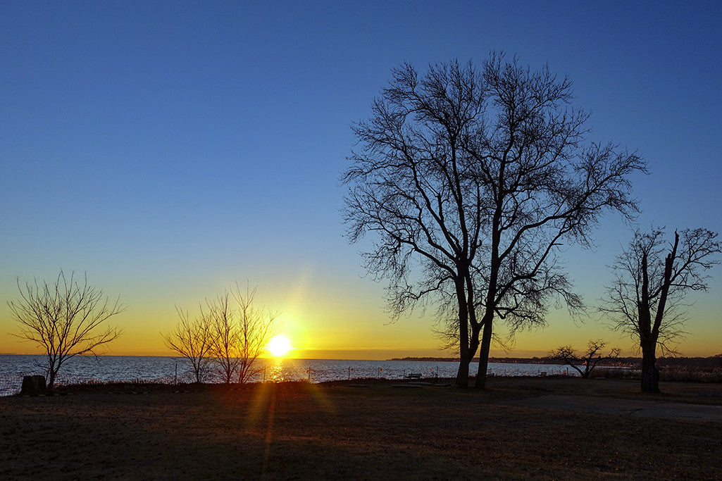 The sun rises over the shores of the Chesapeake Bay in Anne Arundel County, Maryland.