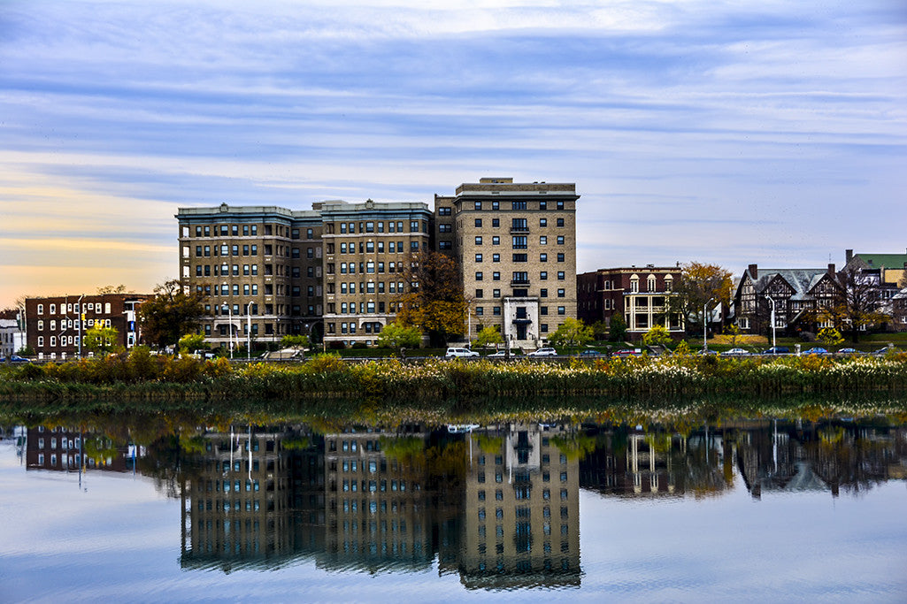 The historic Riviera and Chateau apartments in Baltimore provide a reflective moment on Druid Lake.