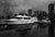 Black and white photograph of some yachts docked in the Baltimore Harbor.
