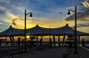 A beautiful sunset peeks beneath a canopy at National Harbor, Maryland.