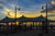 A beautiful sunset peeks beneath a canopy at National Harbor, Maryland.