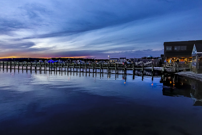 An evening sunset behind the Rusty Rudder Restaurant in Dewey Beach, Delaware.